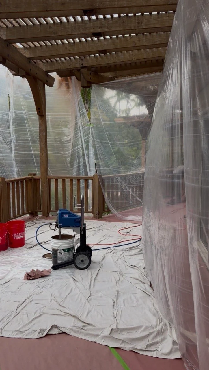 Spray painting equipment under pergola